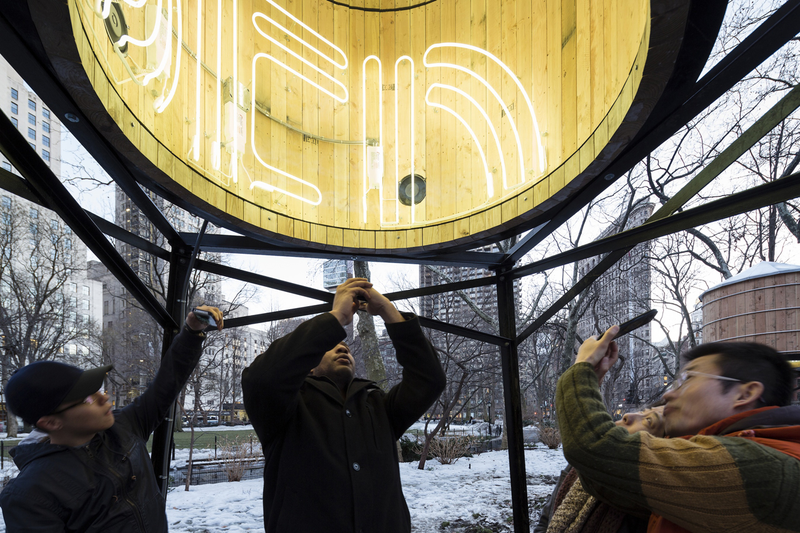 Illustration for article titled Neon Lights Make These NYC Water Towers Into Inter-Dimensional Portals